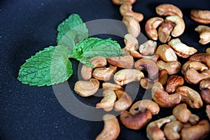 Roasted cashews in the pan.