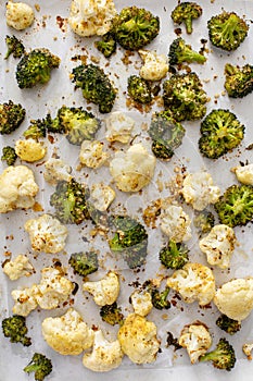 Roasted cauliflower and broccoli on a sheet pan, healthy vegetable side dish