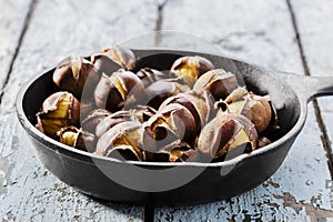 Roasted chestnuts in the pan