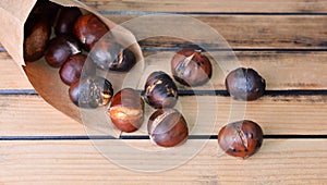 Roasted chestnuts  in a papaer bag