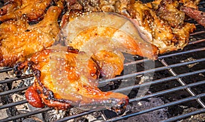 Roasted chicken on barbecue grills