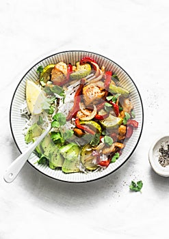 Roasted chicken breast, vegetables and rice bowl - delicious diet balanced lunch on a light background