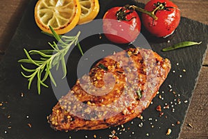 Roasted chicken fillet breast with lemon tomato rosemary mustard seeds honey