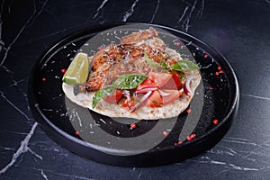 Roasted Chicken on Flatbread With Tomato Salad, Lime Wedge