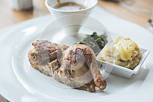 Roasted chicken with mashed potato and special sauce