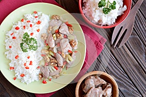 Roasted chicken meat with stalk celery, roasted walnuts and rice