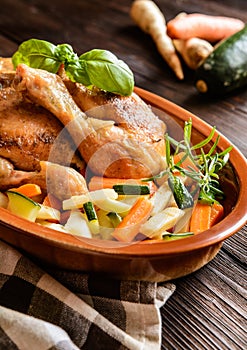 Roasted chicken meat with vegetable garnish