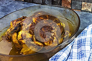 Roasted chicken on rustic plate for thanks giving holiday