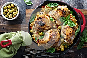 Roasted chicken thighs with rice and olives