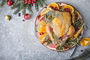 Roasted chicken or  turkey. Traditional festive food for Christmas or Thanksgiving. Christmas Dinner. Winter Holiday table setting