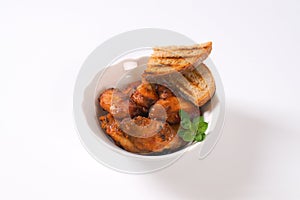 Roasted chicken wings with bread