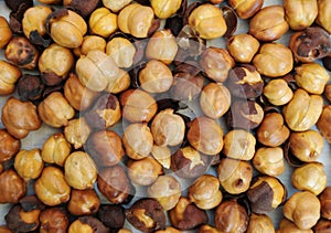 Roasted Chickpea Roasted Gram Roasted chana Roasted Kabuli Chana dried seeds heap closeup image photo