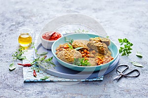 Roasted chickpeas falafel patties with hot spicy sauce
