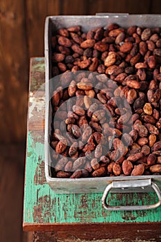 Roasted cocoa chocolate beans in Vintage heavy pan