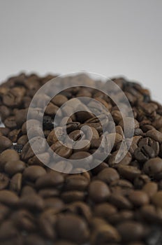 Roasted coffee beans background. .