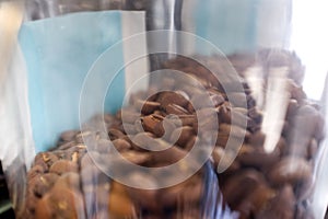 Roasted coffee beans background .