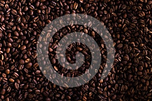 Roasted coffee beans for background. Coffee close up