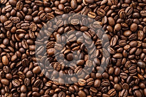 Roasted coffee beans background. Top view. Space for text