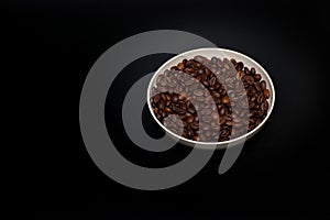 roasted coffee beans in a bowl