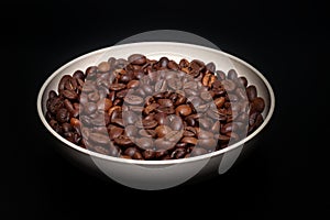 roasted coffee beans in a bowl