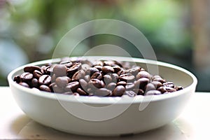 roasted coffee beans in a bowl
