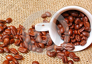 Roasted coffee beans in cup