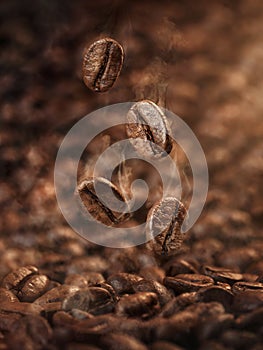 Roasted coffee beans falling down