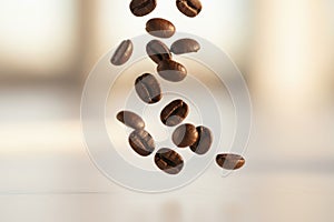 Roasted coffee beans falling in motion