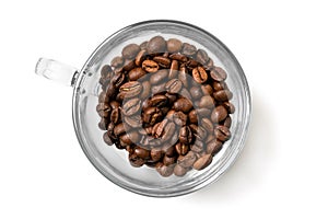 Roasted coffee beans in a glass cup