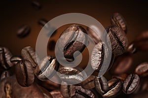 Roasted coffee beans on grey background