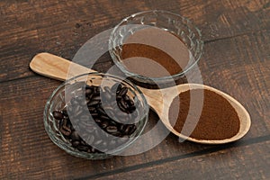 Roasted coffee beans, ground coffee, Cup of coffee, Wooden spoon with roasted coffee