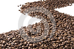 Roasted coffee beans isolated on white background.