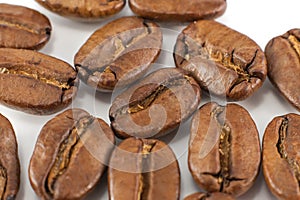 Roasted coffee beans and isolated on a white background