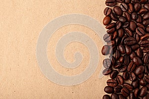 Roasted coffee beans on the light background for wallpaper or decor. Toned