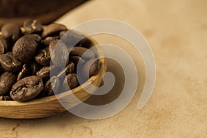 Roasted coffee beans on old vintage open book. Menu, recipe, mock up.