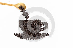 Roasted coffee beans placed in the shape of a cup and saucer on