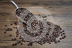 Roasted coffee beans in scoop