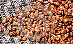 Roasted coffee beans on the table.