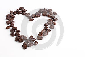 Roasted coffee beans on white background