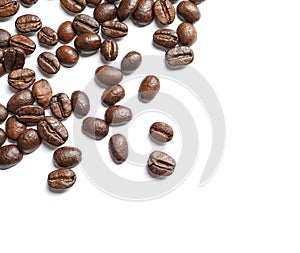 Roasted coffee beans on white background