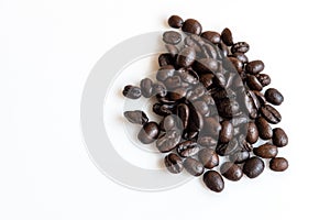 Roasted coffee beans on white background