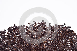 Roasted coffee beans on white background