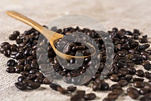 Roasted Coffee Beans and Wooden Spoon: A Vintage Delight