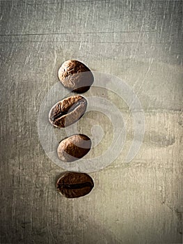 Roasted coffeebeans on background