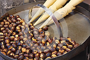 Roasted colorful chestnuts in street cafe