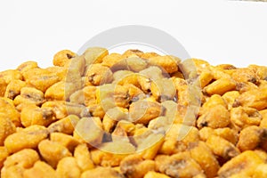 Roasted corn nuts on white background