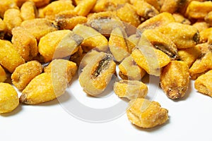 Roasted corn nuts on white background