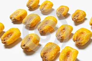 Roasted corn nuts on white background