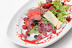 Roasted duck fillet salad with berry sauce