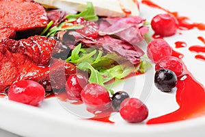 Roasted duck fillet salad with berry sauce